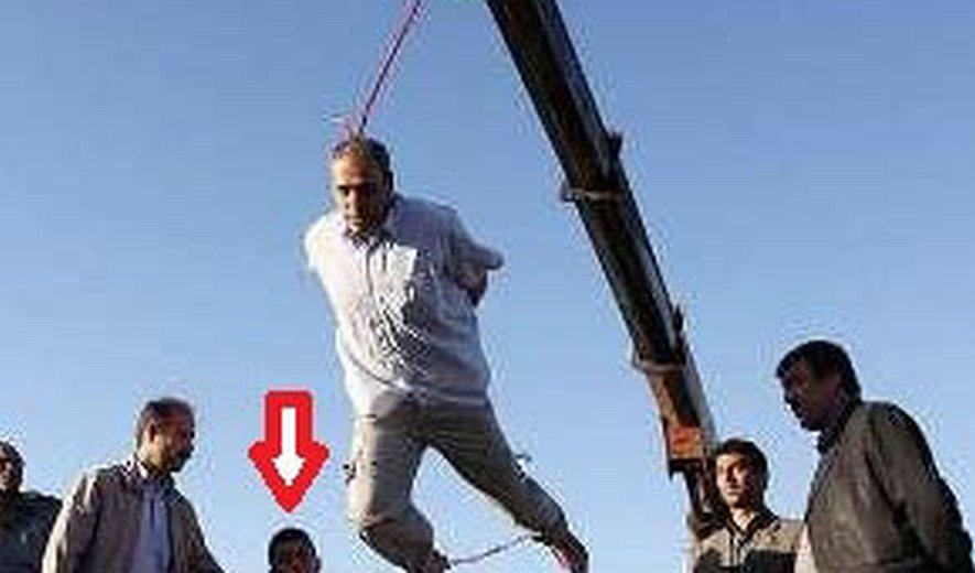 Young boy was used to carry out execution of a man in public in Iran early this morning